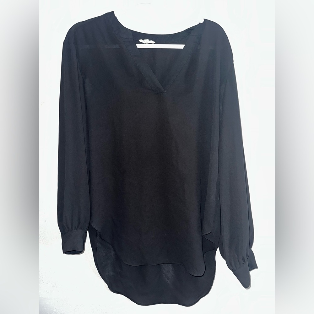 Maurice’s business top sheer